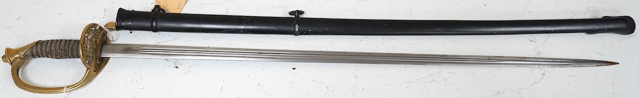 A German (Saxon) infantry officer's sword and scabbard, c.1900, with triple fullered blade, engraved with the cypher of Frederick August II, regulation brass hilt with folding side guard, in its steel scabbard, blade 80c